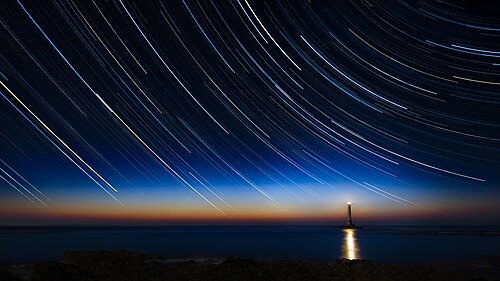 Star trails over La Hague lighthouse